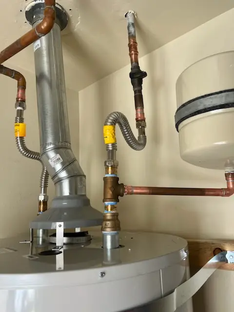 Water heater installation and plumbing repair in Woodtick